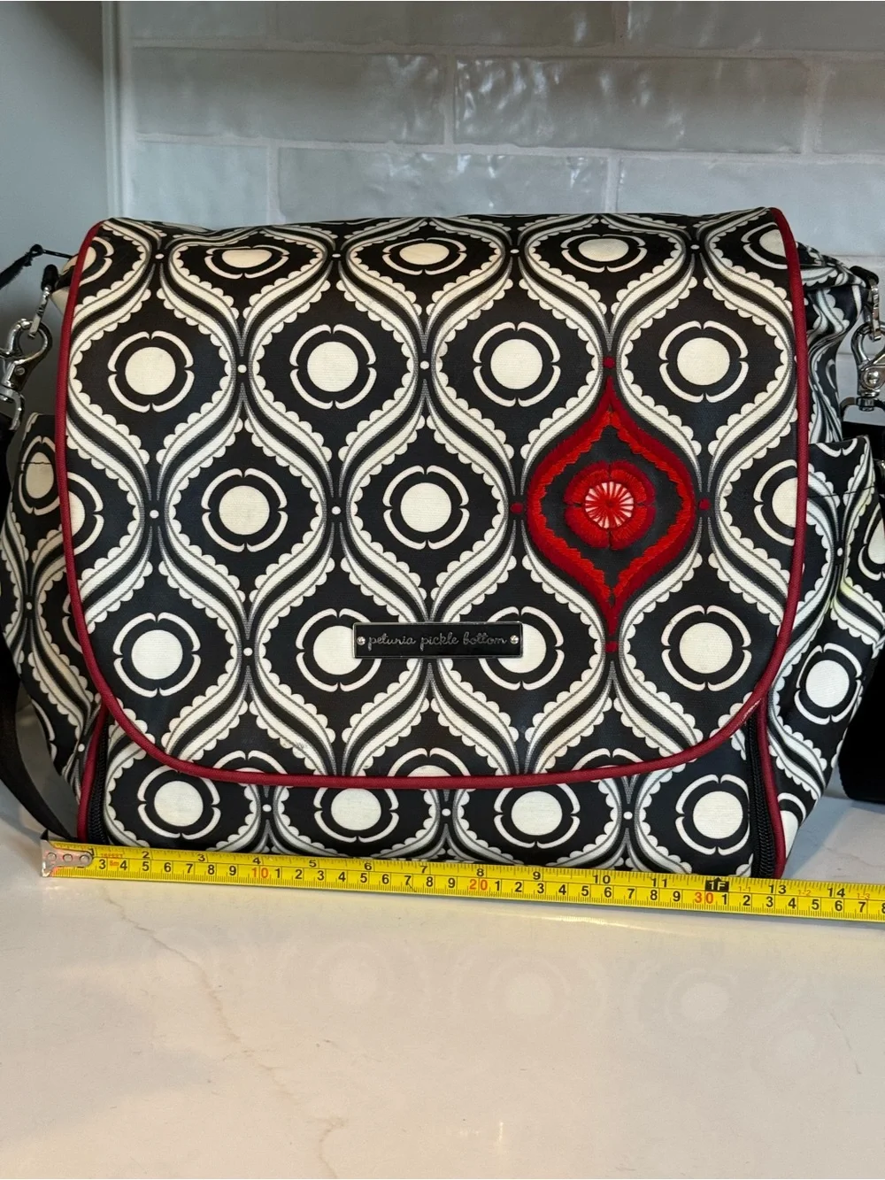 Petunia Pickle Bottom Black & White Geometric Baby Bag with Red Accent